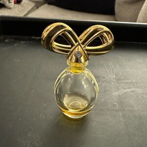 White diamonds by Elizabeth Taylor perfume bottle with faux diamond